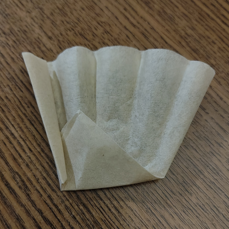 A coffee filter folded to become a cup